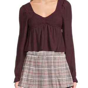 Smocked V neck long puff sleeve top